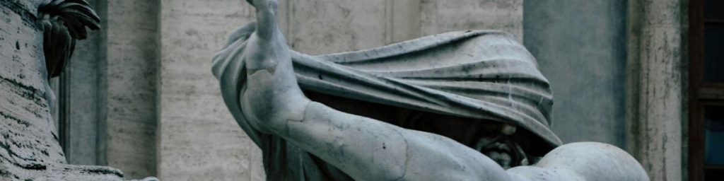 Statue with covered eyes representing visual distractions and the challenge of maintaining focus.