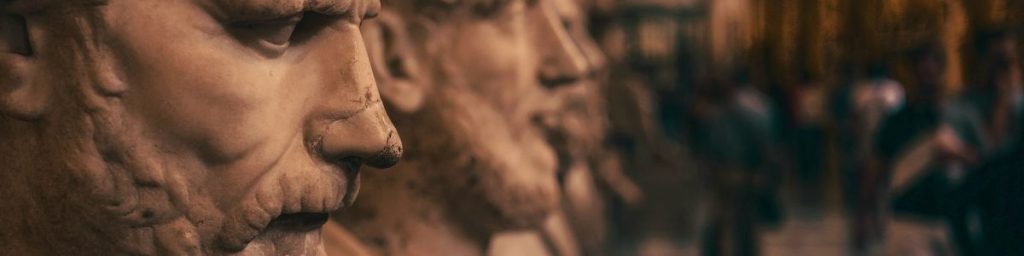 Close-up of a focused ancient statue's face symbolizing deep concentration.